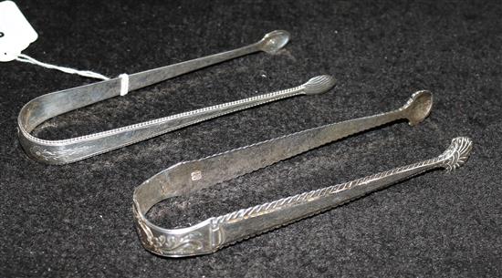 Two pairs of silver sugar tongs